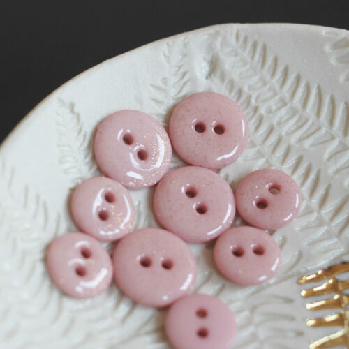 Bouton glitter deux trous - Rose pâle