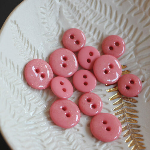 Bouton glitter deux trous - corail