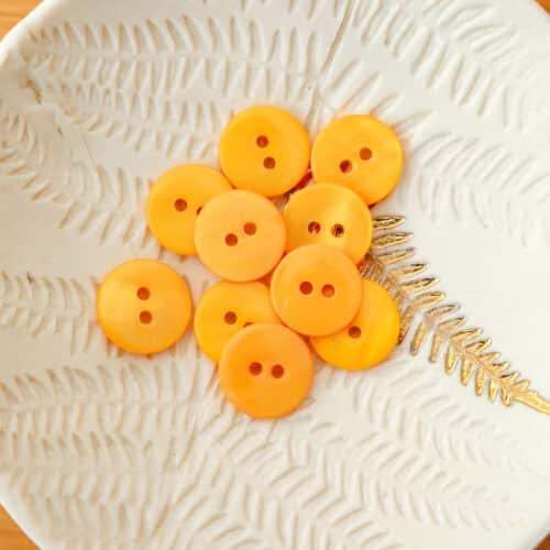 Bouton en nacre plat - Jaune