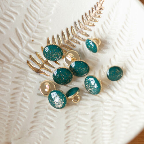 Bouton de bottine pailletté or - Émeraude